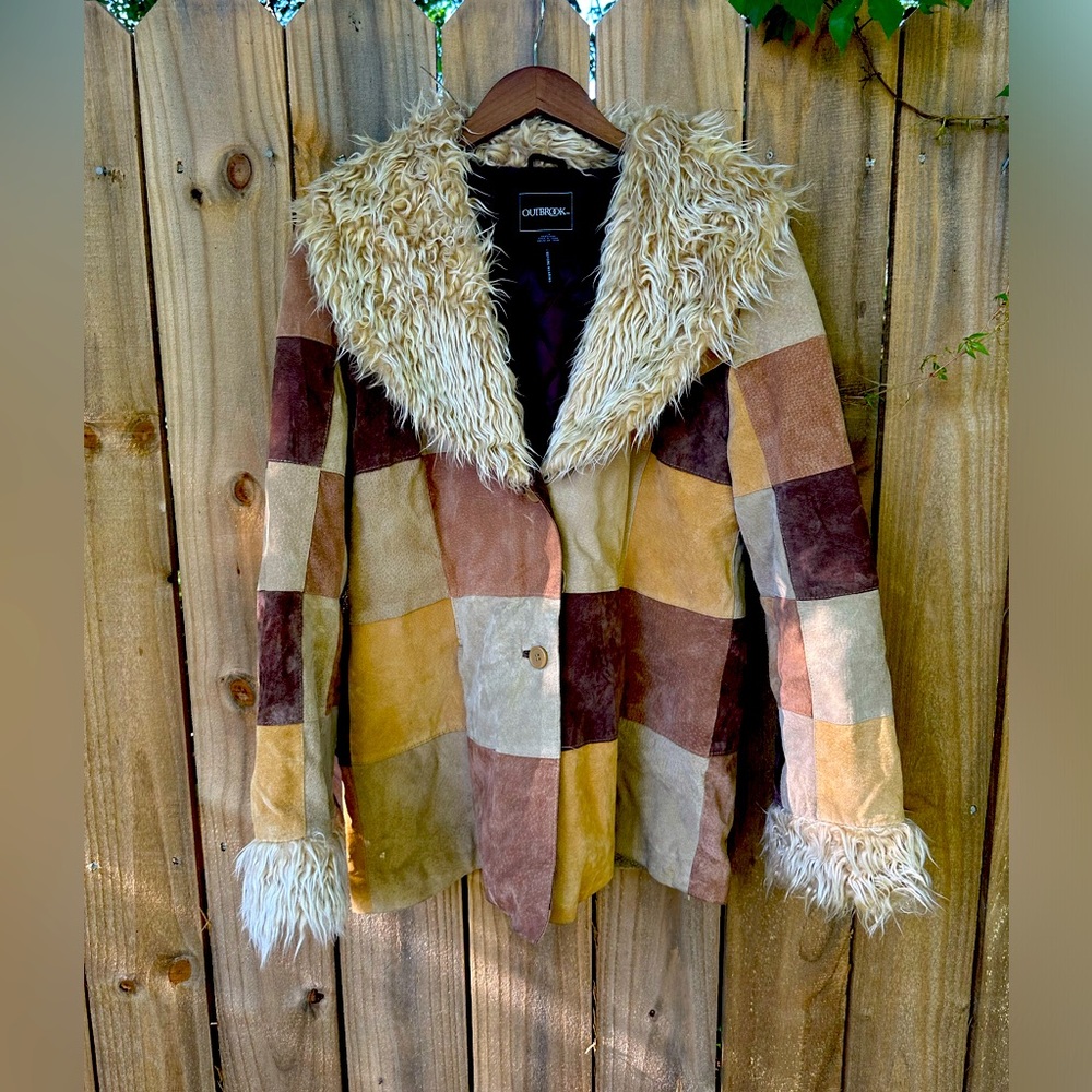 Own a piece of sartorial history. Vintage brown patchwork, leather jacket.